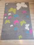 Dywan w motylki 160x230 jak nowy