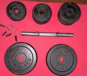 Barra de musculação + discos