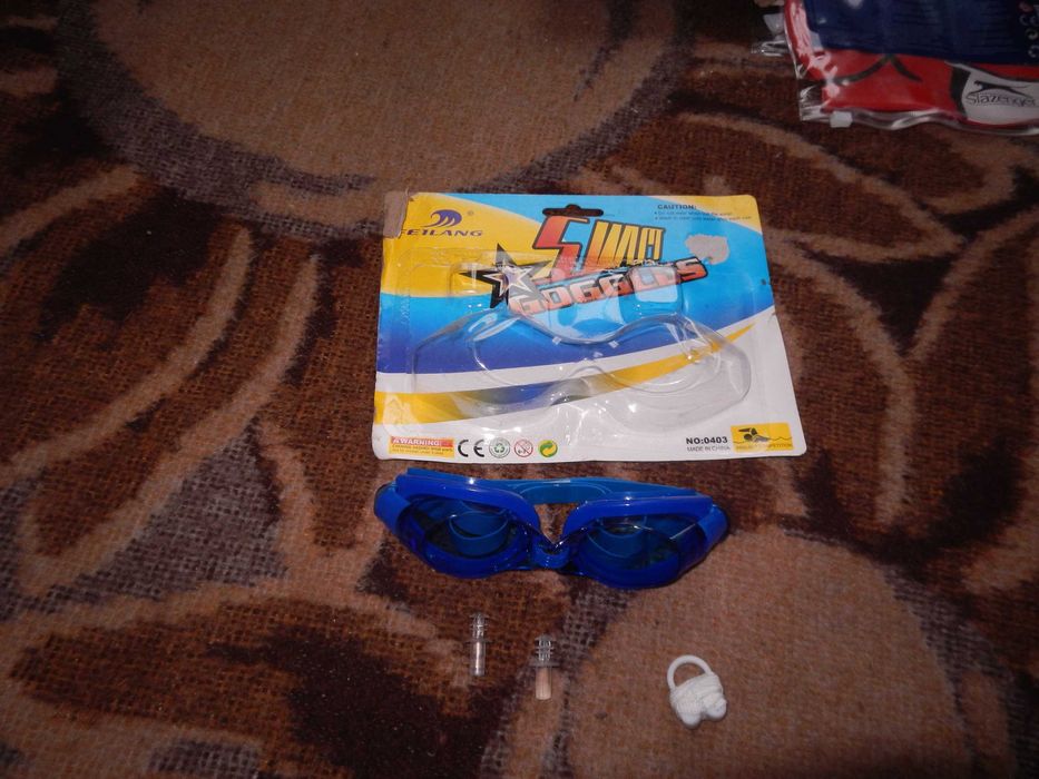 Wyprzedaż->okularki pływackie dla dzieci klips ,zatyczki->zestaw