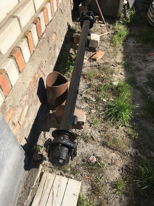 Балка з ступецями для прицепа