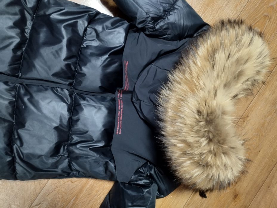 Брендовый пуховик с натуральным мехом