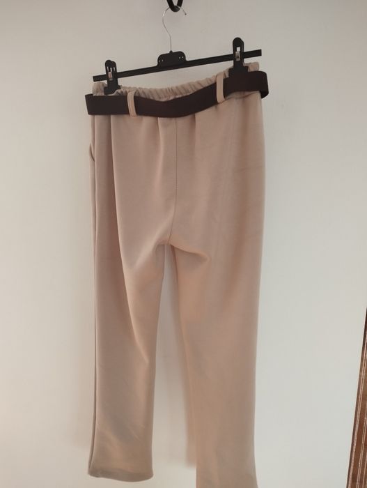 Nowe włoskie spodnie z paskiem i kieszeniami miły materiał większe