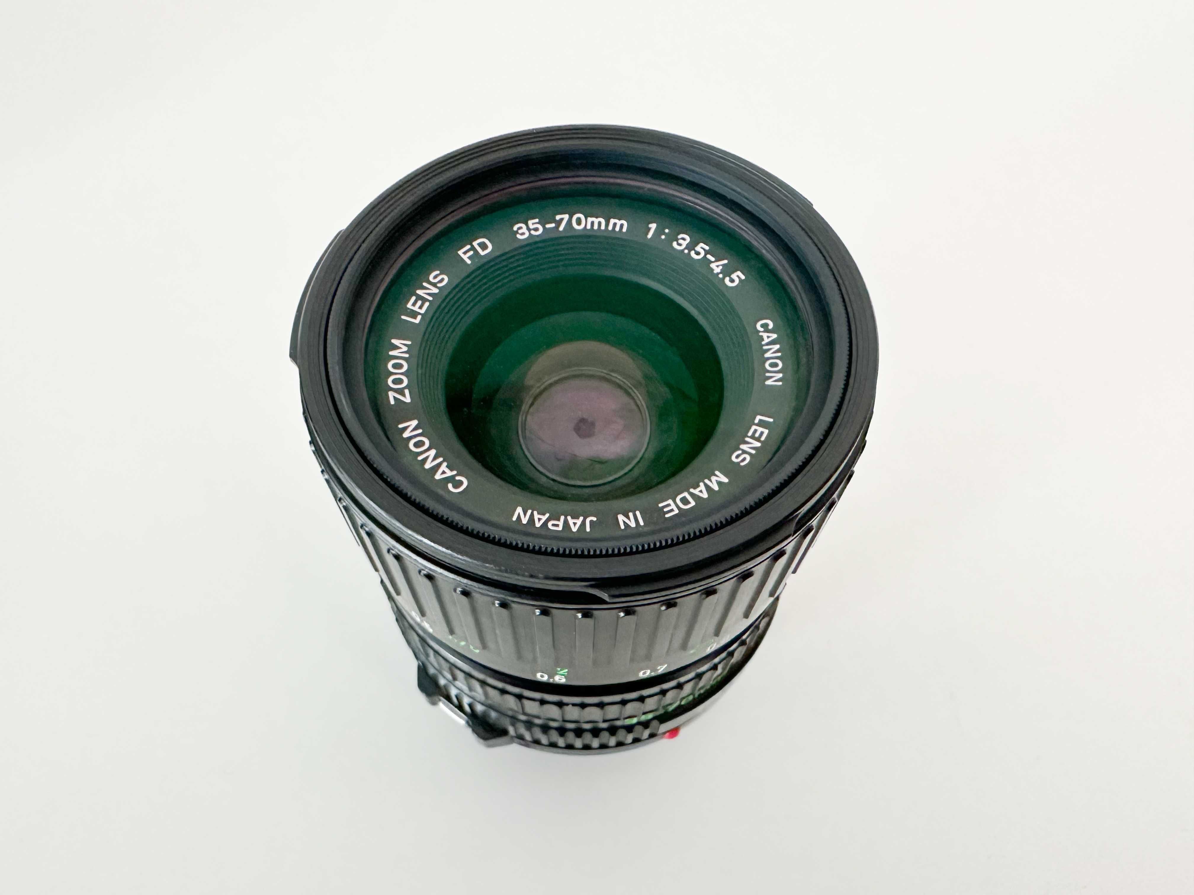 Canon T50 + obiektyw FD ZOOM 3,5 35-70 mm + lampa speedlite 166A