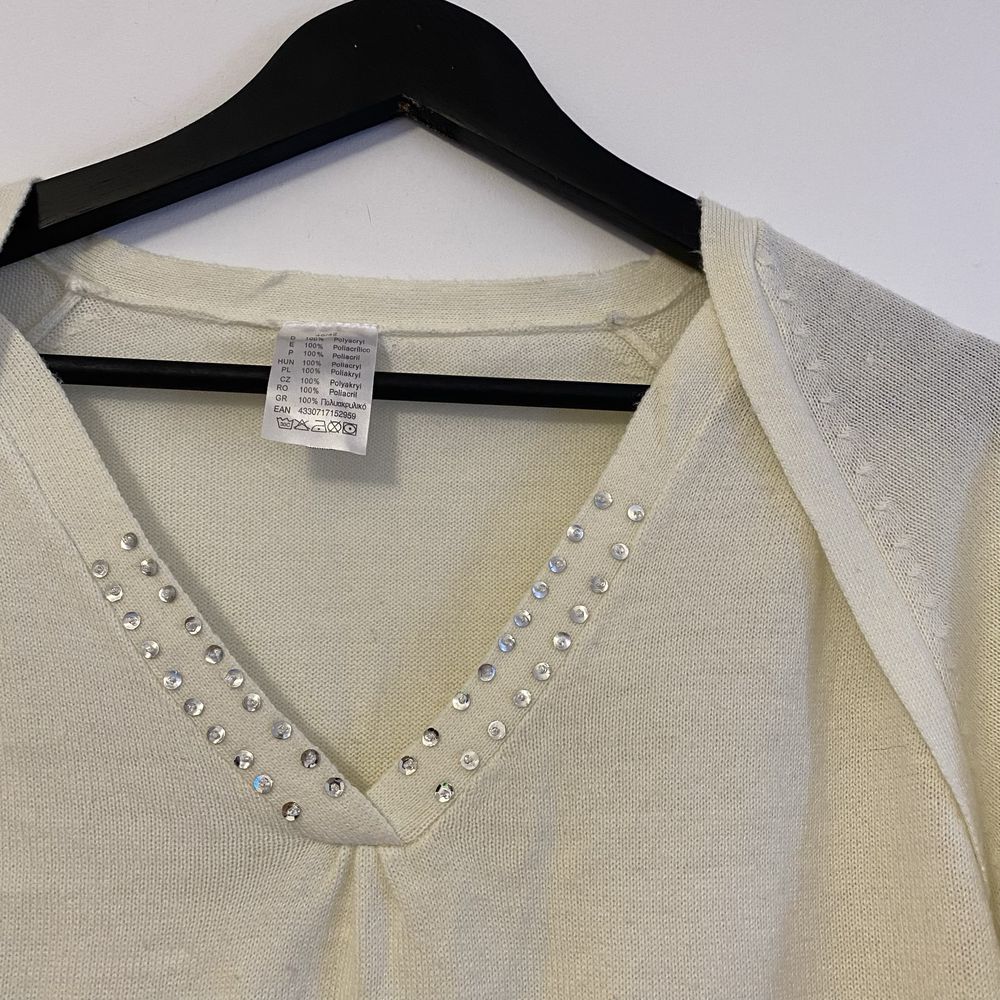 Kremowy sweterek 40 L