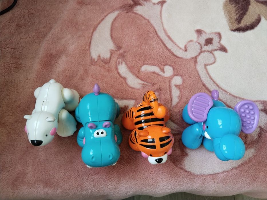 Тріскачки, іграшки - тріскачки, трещетки Fisher Price