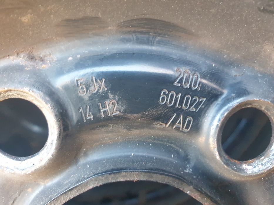 Kola zimowe Vw Polo VI 185 70 R14  z kołpakami VW