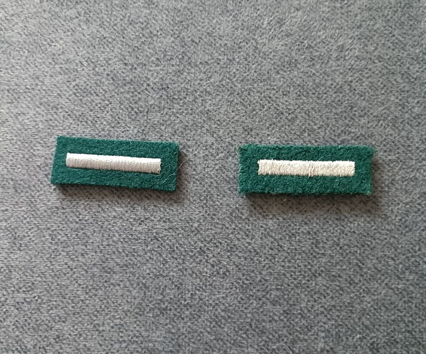 Stopień starszego szeregowego na beret.