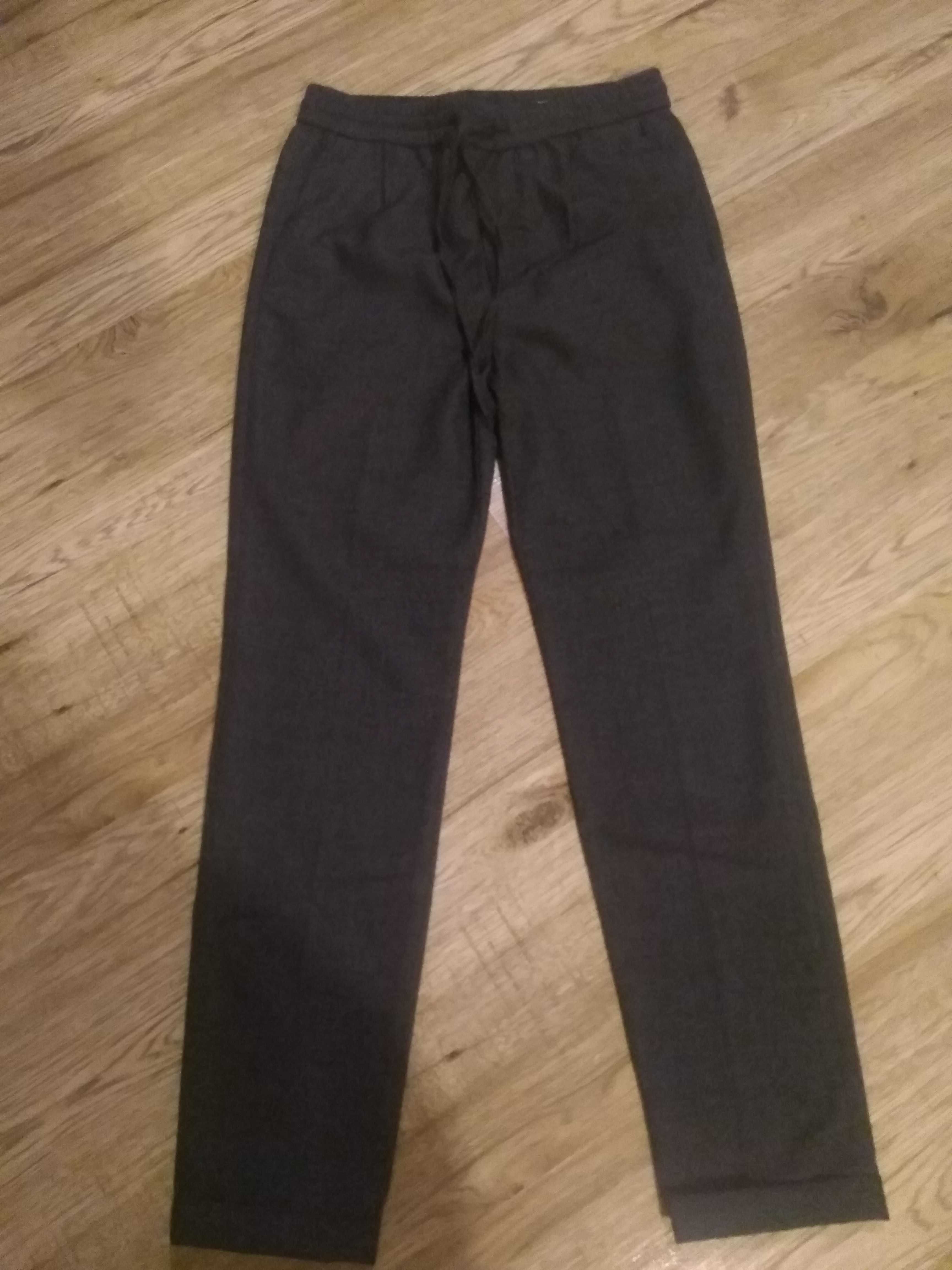 Męskie młodzieżowe eleganckie joggersy slim fit H&M rozm. XS