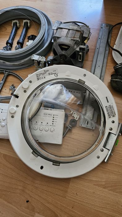 Części zamienne do pralki Whirlpool AWO/D 5520/P koło pasek silnik wąż
