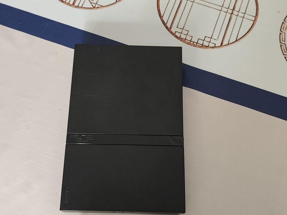 PlayStation 2 Slim – ideal para reparação ou peças