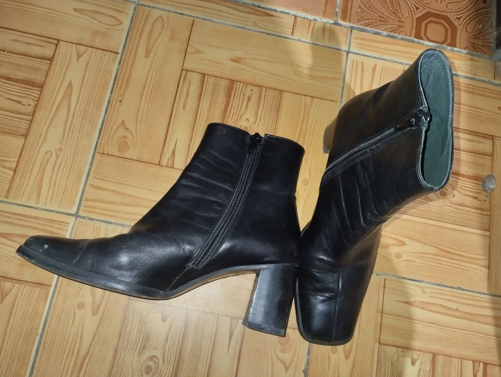 Botas com salto alto