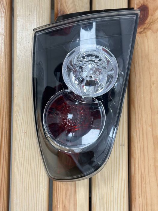 Продам задний фонарь левый Mazda 3 FP3476F13-t, цена 1500 новая