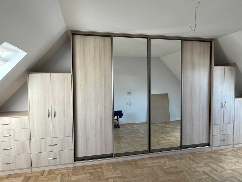 Szafy przesuwne pod wymiar / Garderoby na wymiar