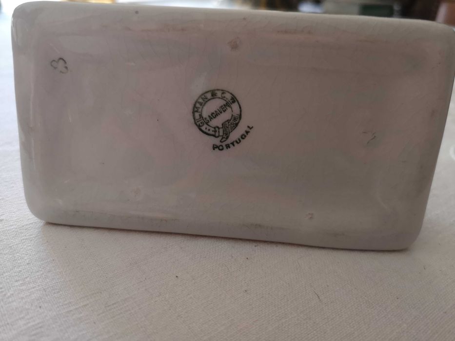 paliteiro antigo em forma de esfinge