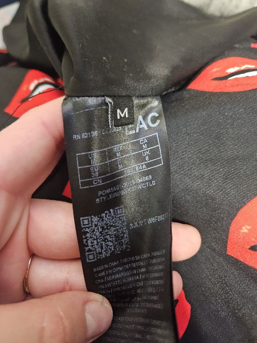 Kombinezon na lato elegancki Guess rozm M w usta