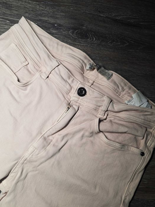 Różowe jeansy Zara r. 40