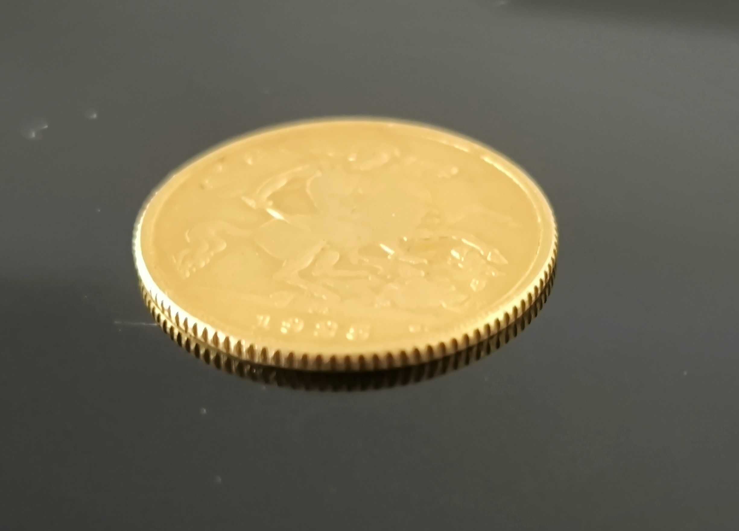 Meia libra de ouro Sovereign King George V de 1925