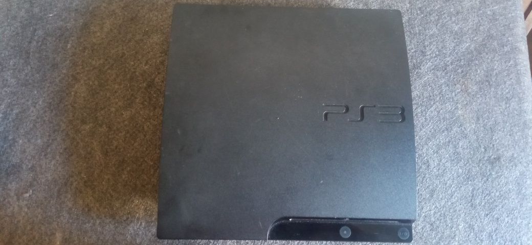 PlayStation 3 Slim com caixa