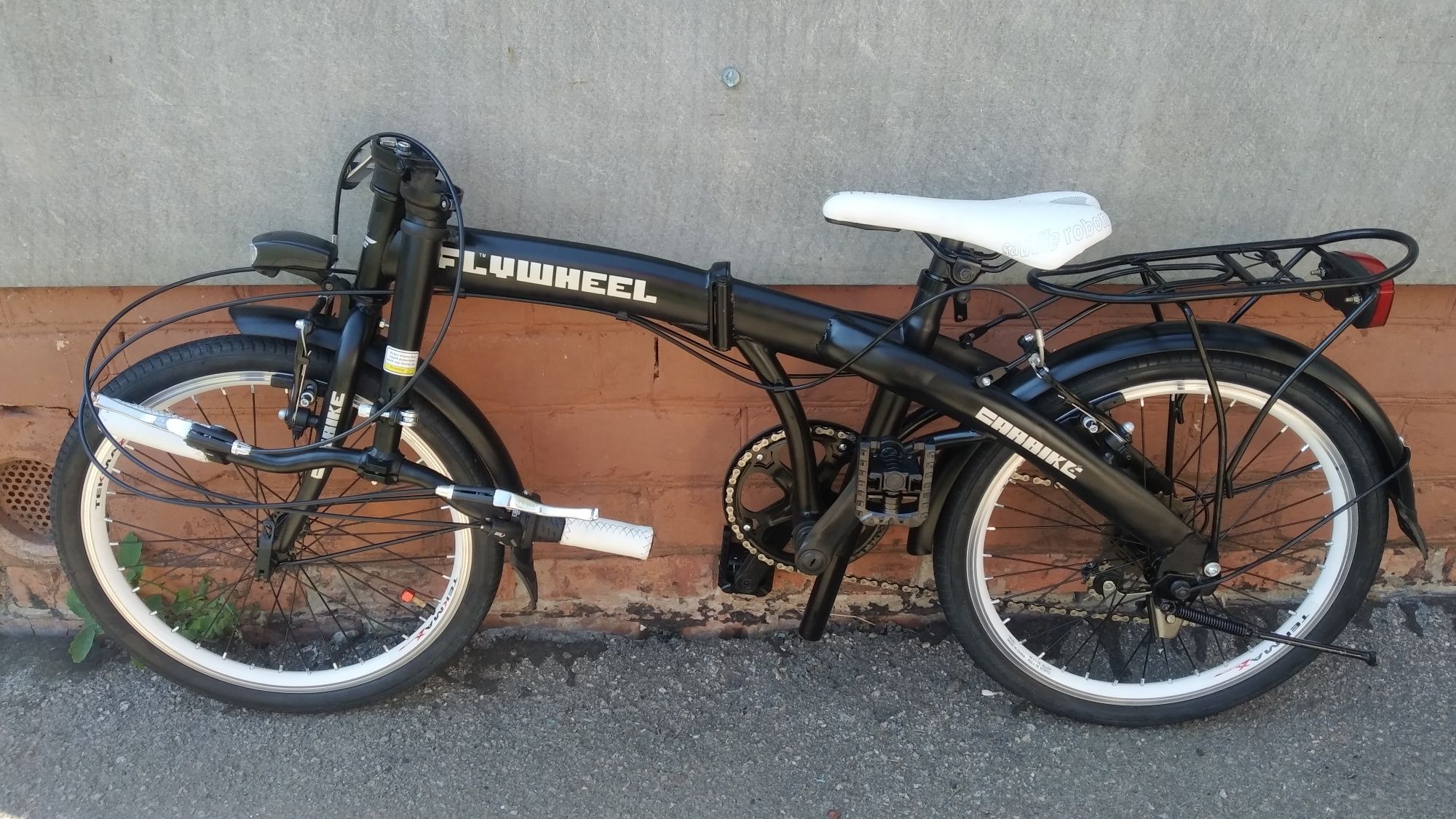 Итальянский чёрный складной  FLYWHEEL CARBIKE и б/у немецкий CITY STAR