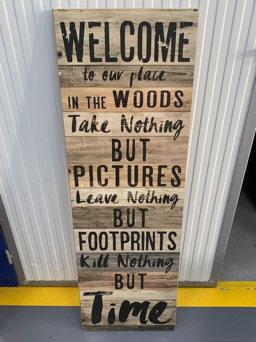 Quadro motivacional de madeira.