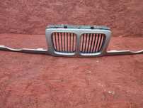BMW E34 ORYGINALNY NOSEK / GRIL PRZEDNI + NERKI WĄSKA LAMPA PRZED LIFT W DOBRYM STANIE O NR. 1 978 880 / 1 973 835 OEM BEZ RDZY