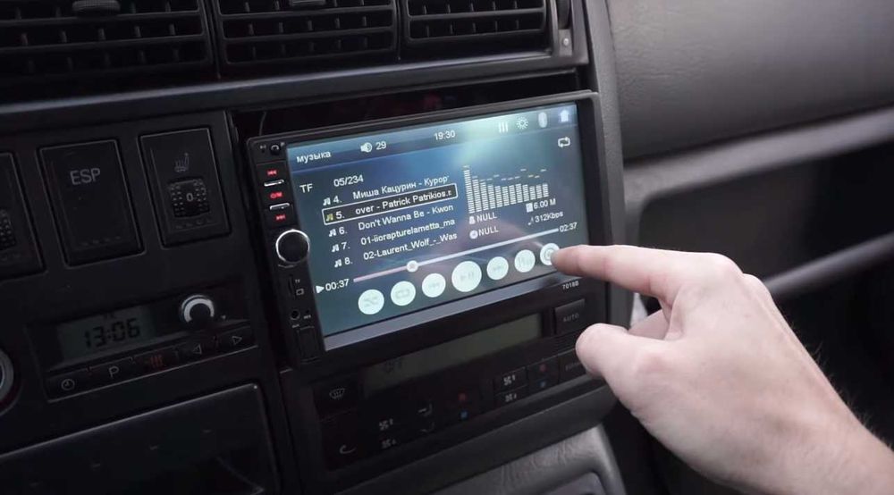 Универсальная 7018b 2din магнитола сенсорное управление з рамкой