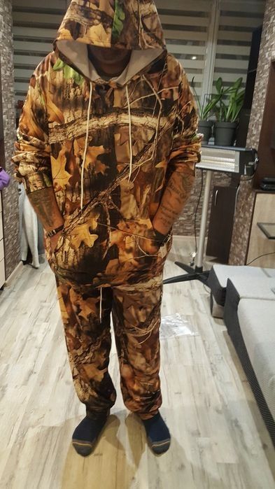 мужскую одежду  52 размер