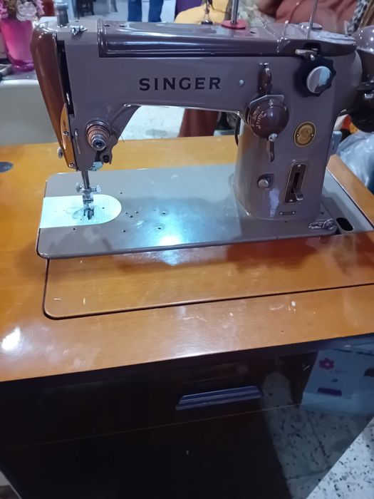 Maquina de  costura marca singer