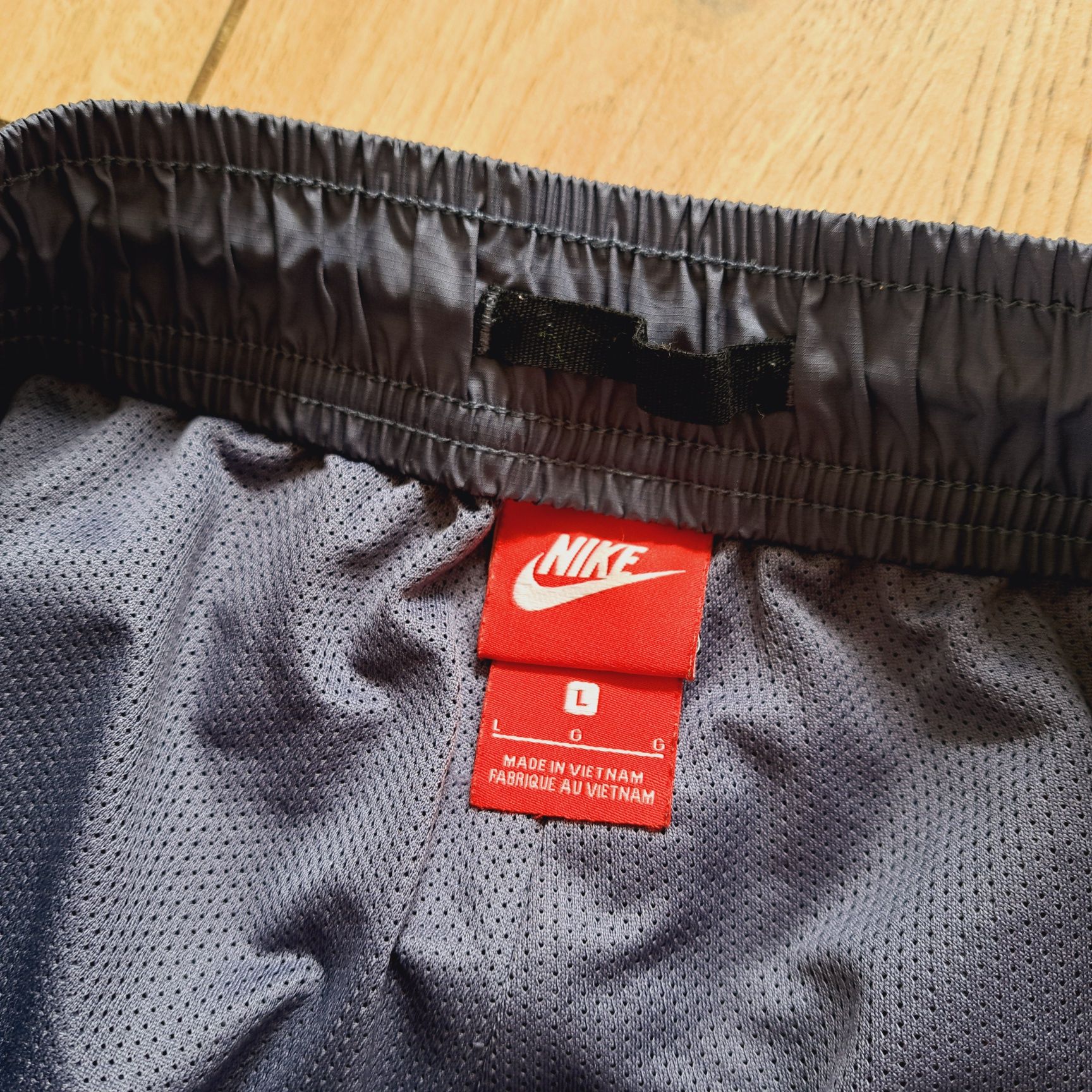 Spodnie Nike Wind running do biegania sportowe