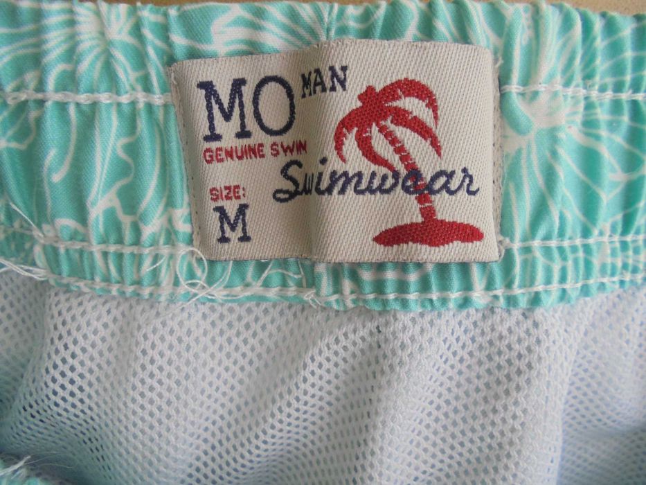 calção de homem cor verde e branco