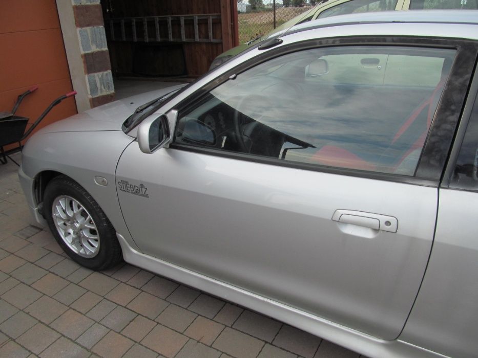 Drzwi prawe lewe Mitsubishi Colt V 5 Cjo Cj0 95-03r A69 Srebrne