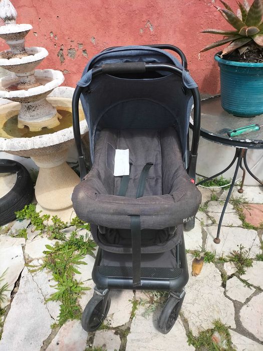 Carrinho de bebe com ovo e malinha