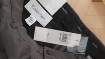 Nowe męskie spodnie Calvin Klein 33W34L 22x34