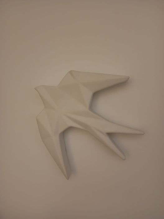 Andorinhas decorativas de parede