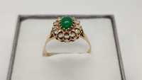 Złoty pierścionek z zielonym oczkiem i cyrkoniami 3,78g p585 r.20/LID