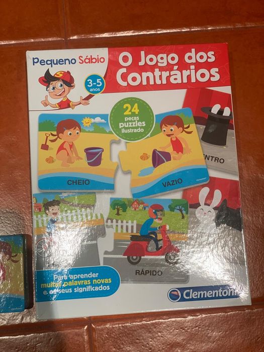 Caixa com 24 peças de puzzle - O jogo dos contrarios