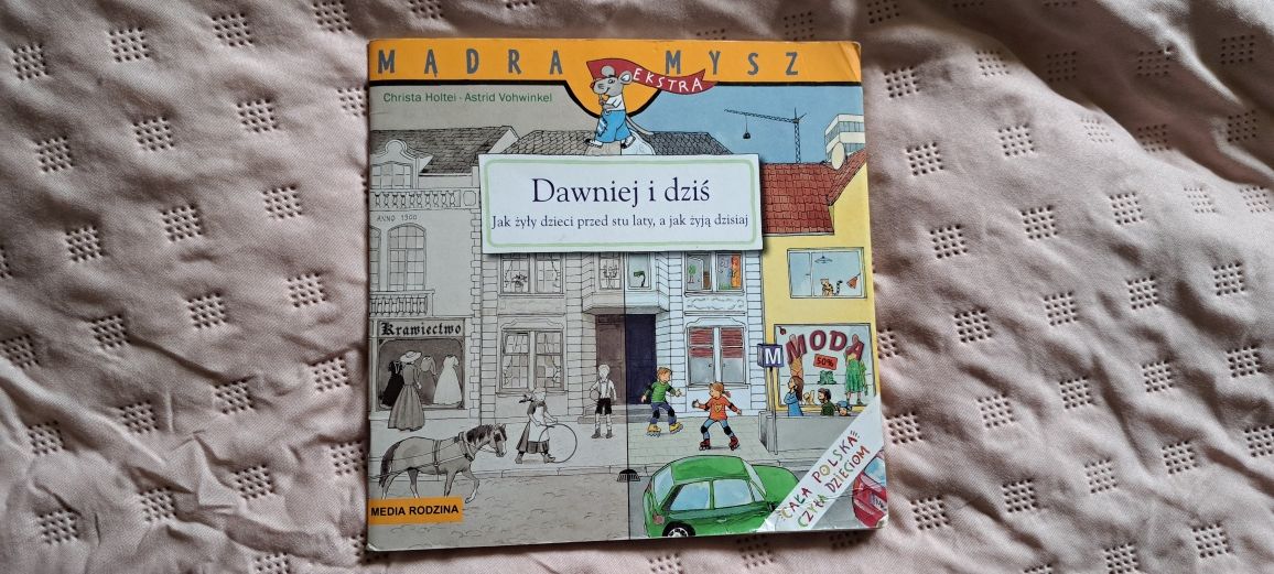 Ksiażeczka dla dzieci "Dawniej i dziś -jak żyły dzieci przed stu laty.
