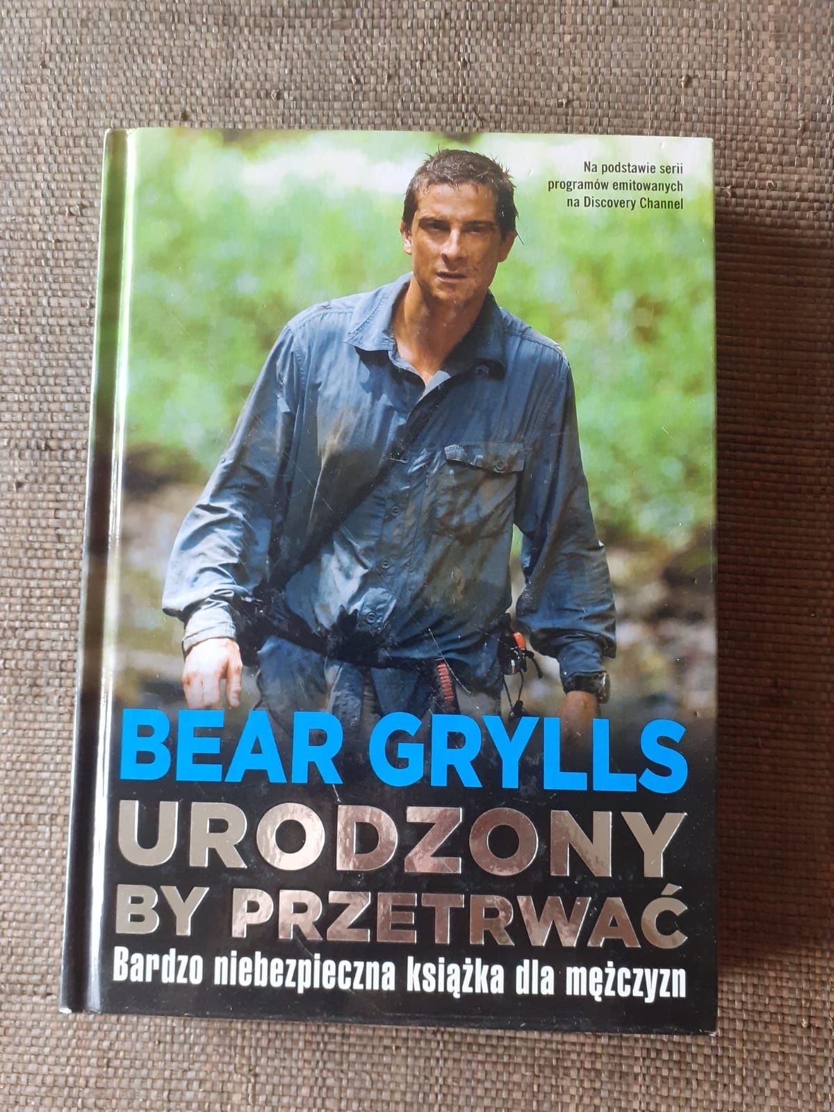 Ksiazka Urodzony by przetrwac Bear Grylls jak nowa