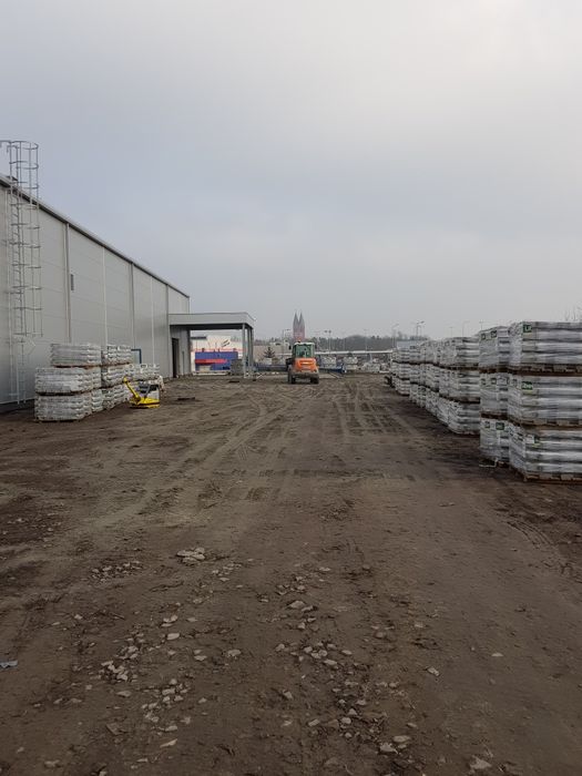 Maszynowe Układanie kostki brukowej utwardzenie terenu brukarstwo