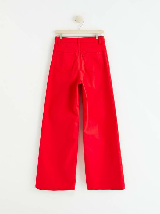 Красные джинсы колокола wide leg брюки палаццо