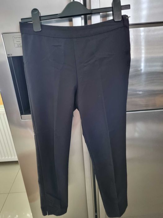 Sprzedam paczkę 10 par spodni roz. 36