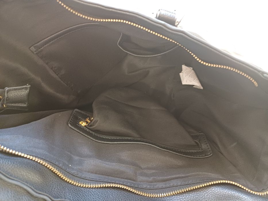 Mala de senhora Misako usada duas vezes