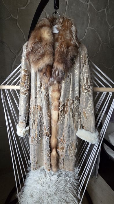 Piękne futerko z królika pokryte materiałem