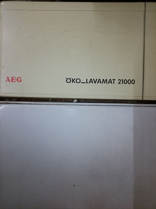 Пральна машинка вертикального завантаження