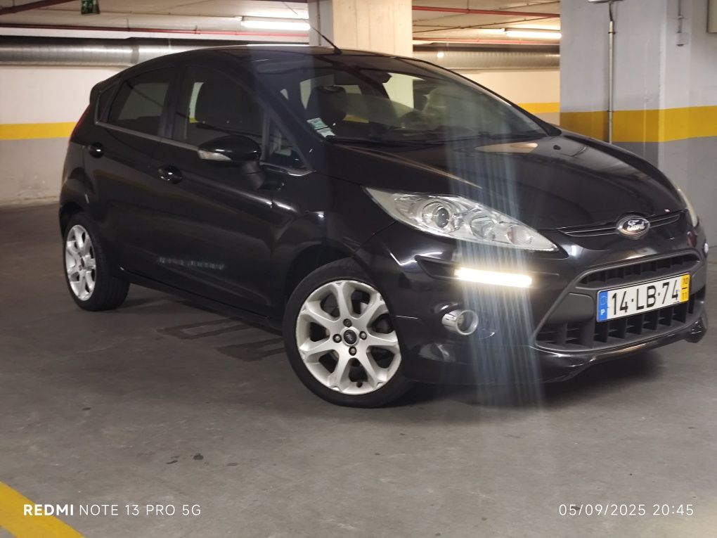1.25 Titanium NOVO 90mil  kms