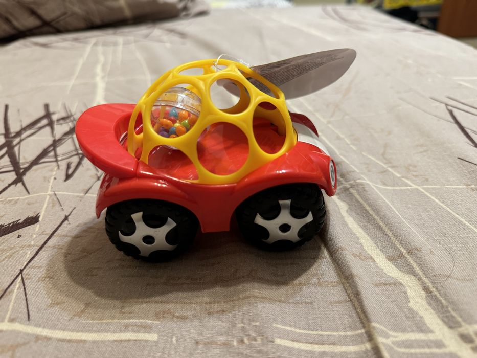 Автомобіль-брязкальце іграшка