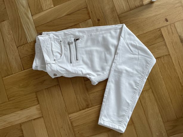Białe spodnie L