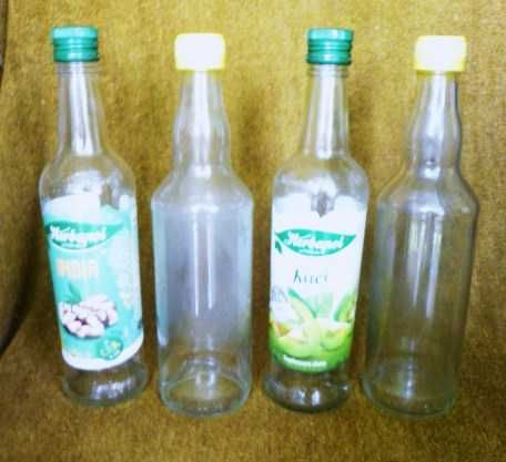 Butelki szklane poj. 0,5 l, z nakrętkami, na soki, nalewki itp.