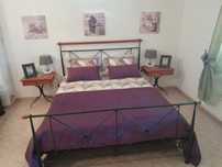 Quarto completo em madeira e ferro forjado