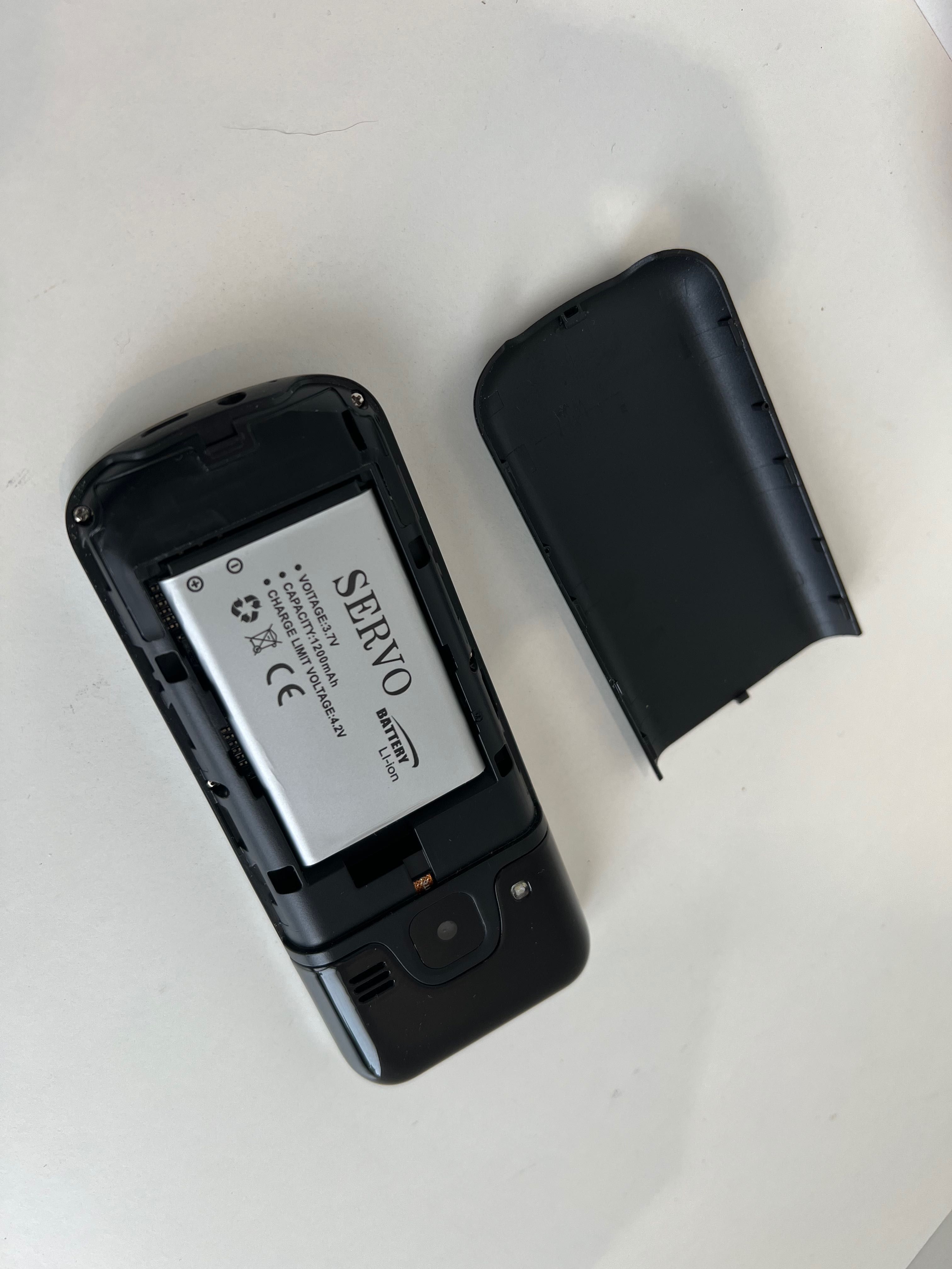 4х симний телефон Servo V9500